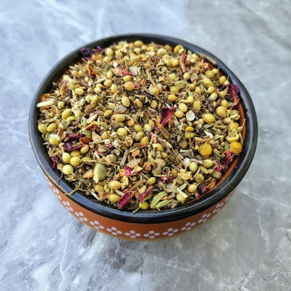 Actual picture of thyroid care tea pack and the tea ingredients in a bowl.