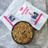 Actual picture of thyroid care tea pack and the tea ingredients in a bowl.